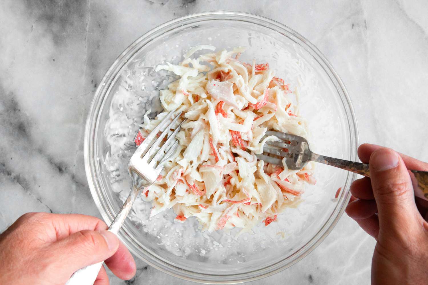 Crab Broken Apart Using Two Forks for California Rolls Recipe