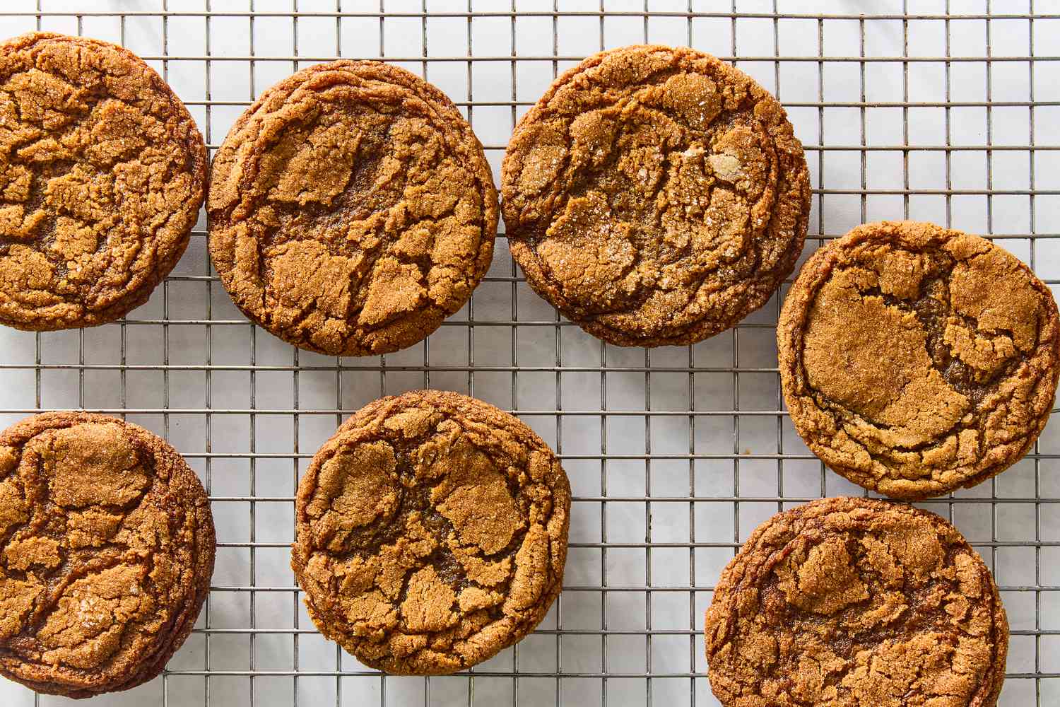 Molasses spice cookies on a cooling rack