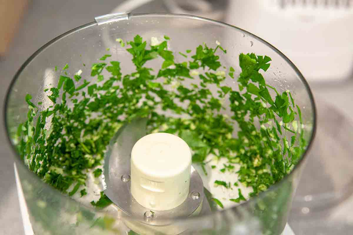 pulse parsley and garlic in a food processor