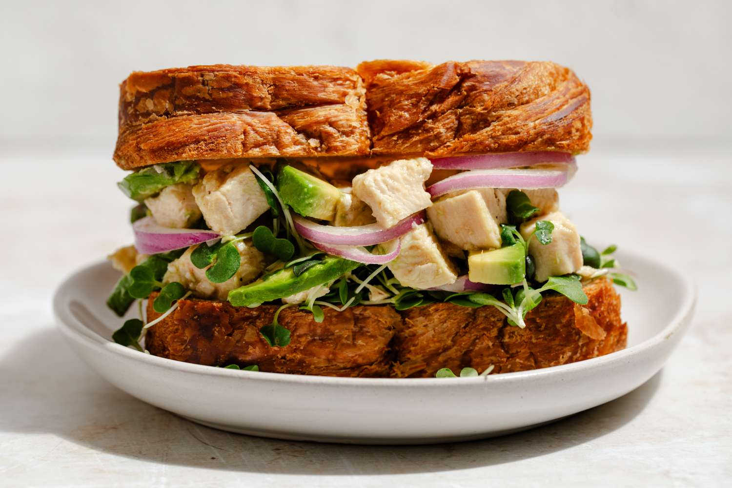 california chicken salad sandwich on a plate