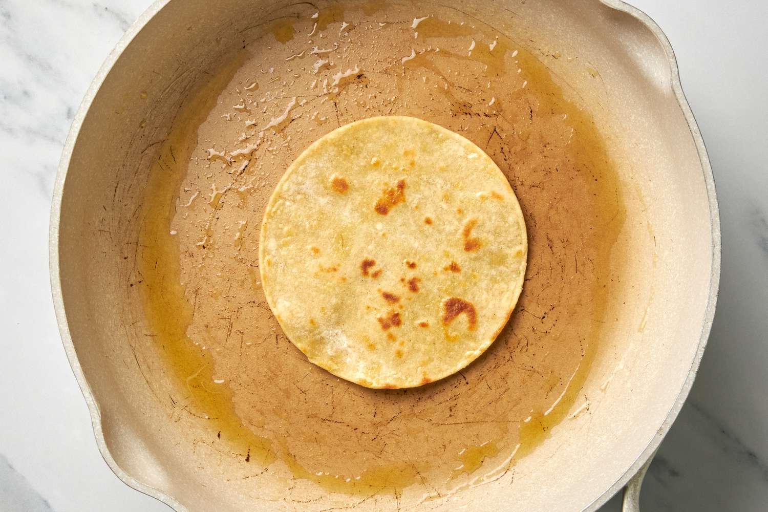 Tortilla Heated on an Oiled Skillet for Huevos Rancheros Recipe 