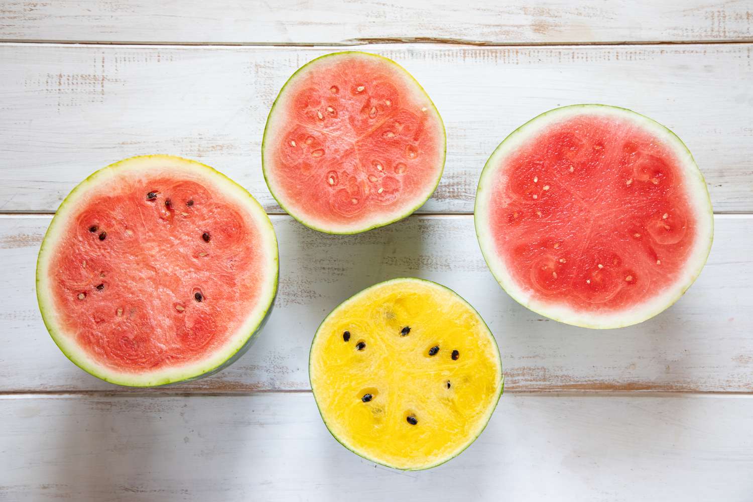 Varieties of cut red and yellow watermelon