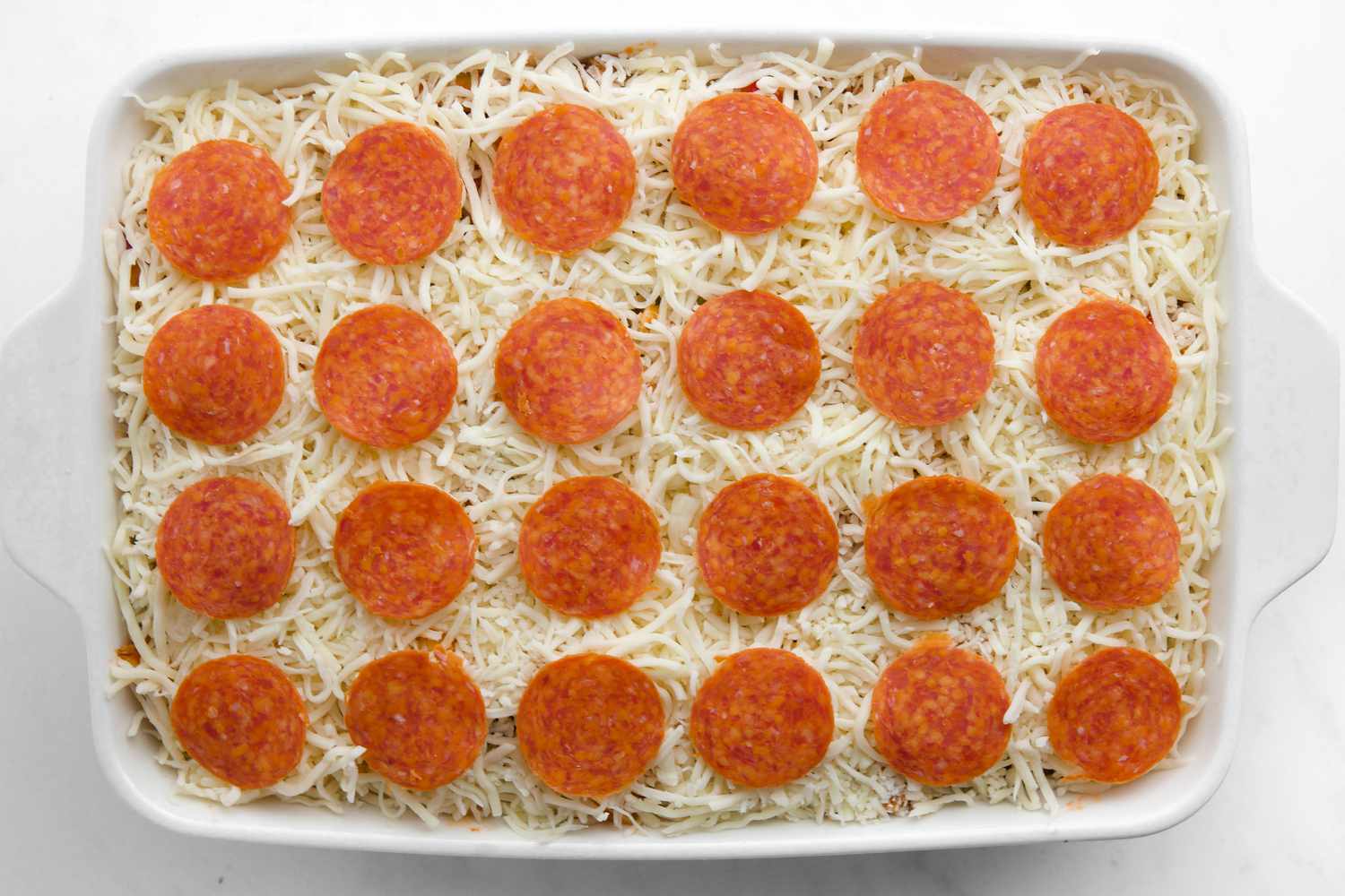 Assembled Pizza Casserole ready to bake.