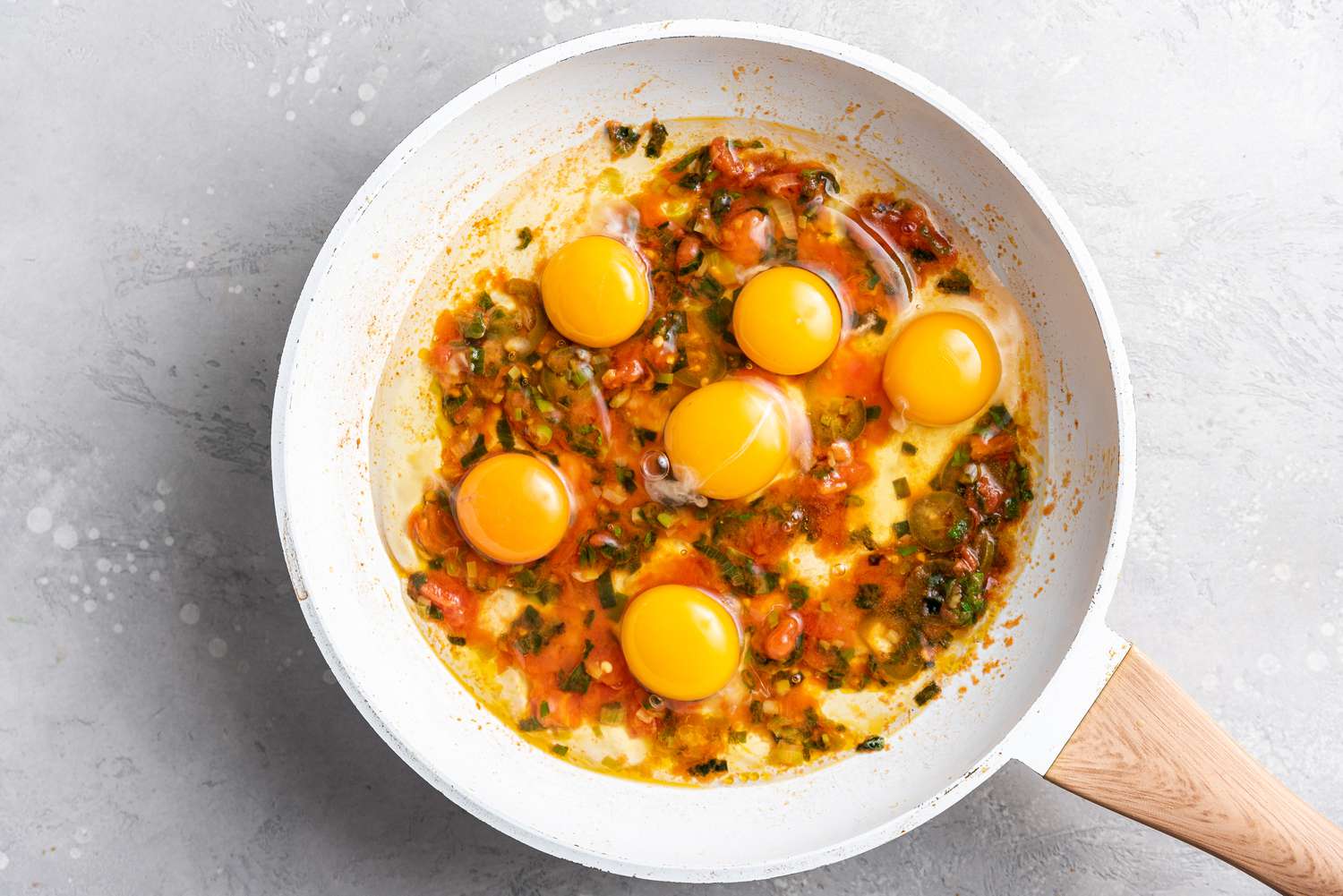 Eggs Added to Tomatoes and Onions for Scrambled Eggs with Salsa Recipe