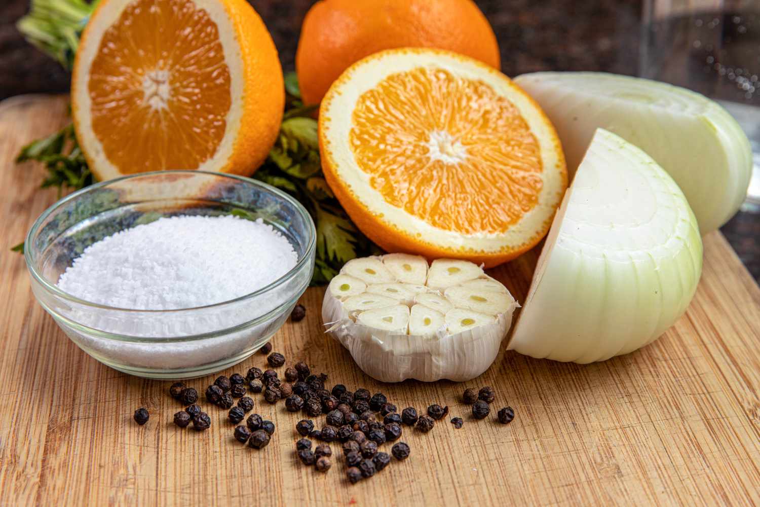 Ingredients on a cutting board to make the brining liquid for whole turkey.