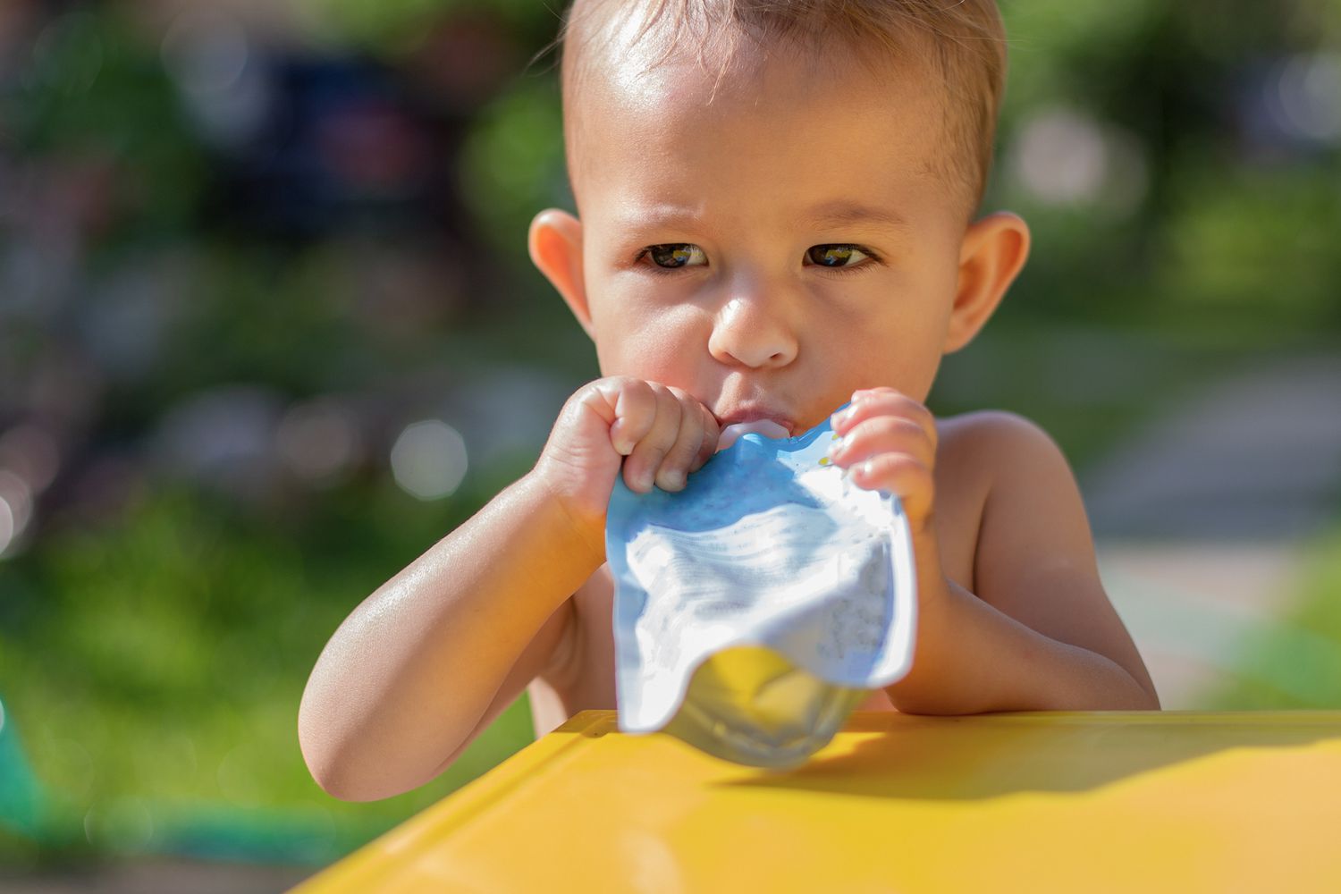 Child eating a fruit punch 