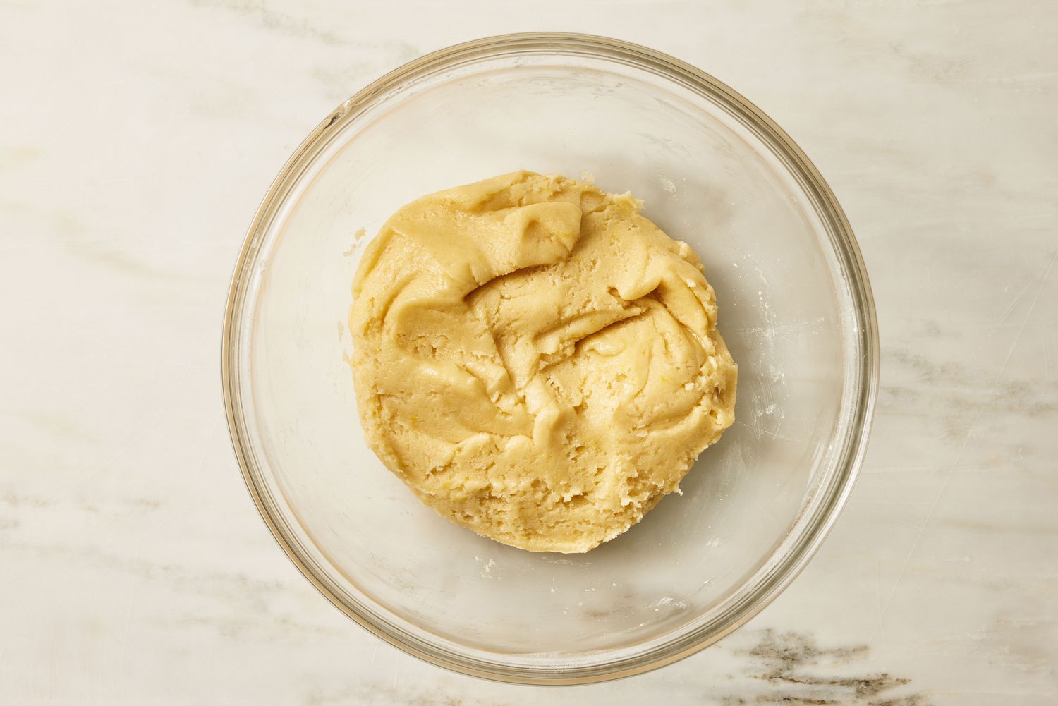 cake ingredients mixed together to form a thick batter for Lemon Gooey Butter Cake recipe