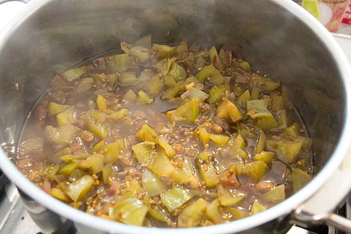 boiling end of season tomatoes for green tomato chutney
