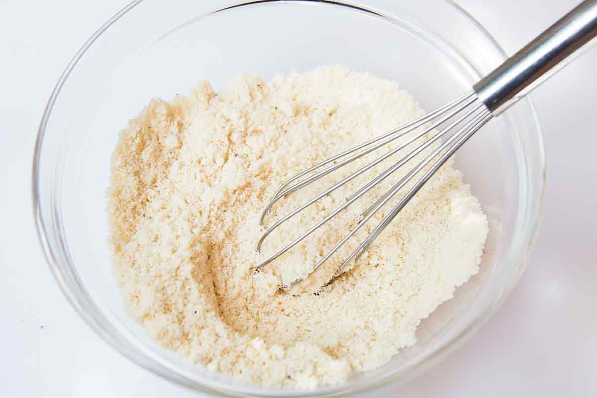 whisk together blanched almond flour, baking powder, ground cardamom