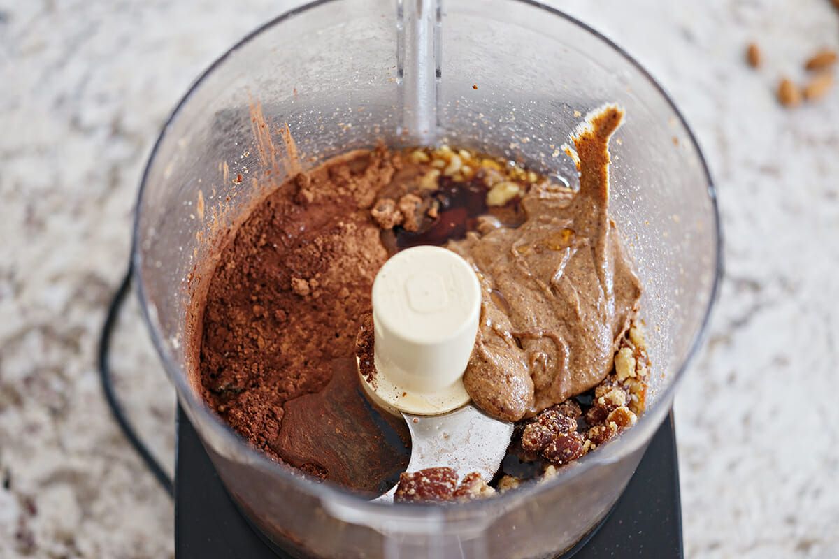 Chocolate almond butter balls add the maple syrup, almond butter