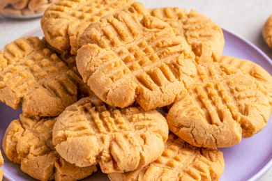Peanut butter cookies on a purple plate