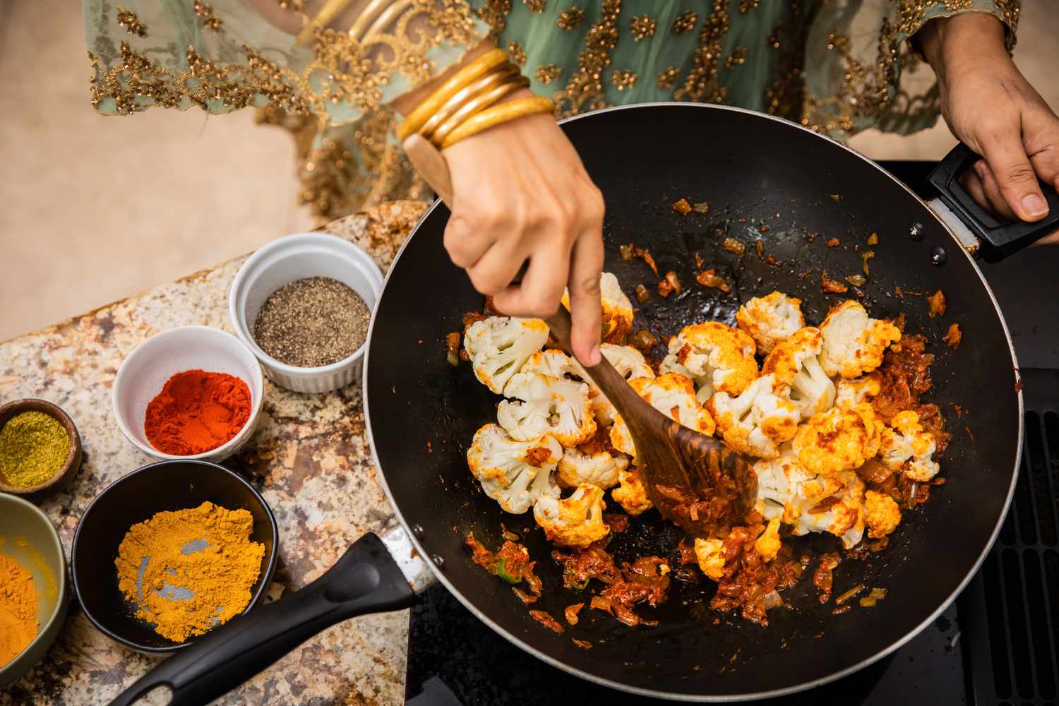Spices and cauliflower for Gholpi (Afghan Stewed Cauliflower)