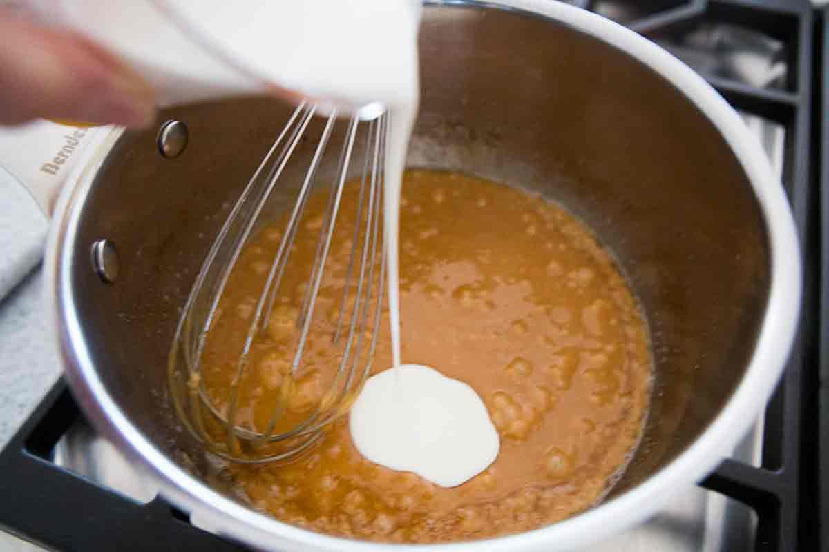 add cream to caramel sauce mixture