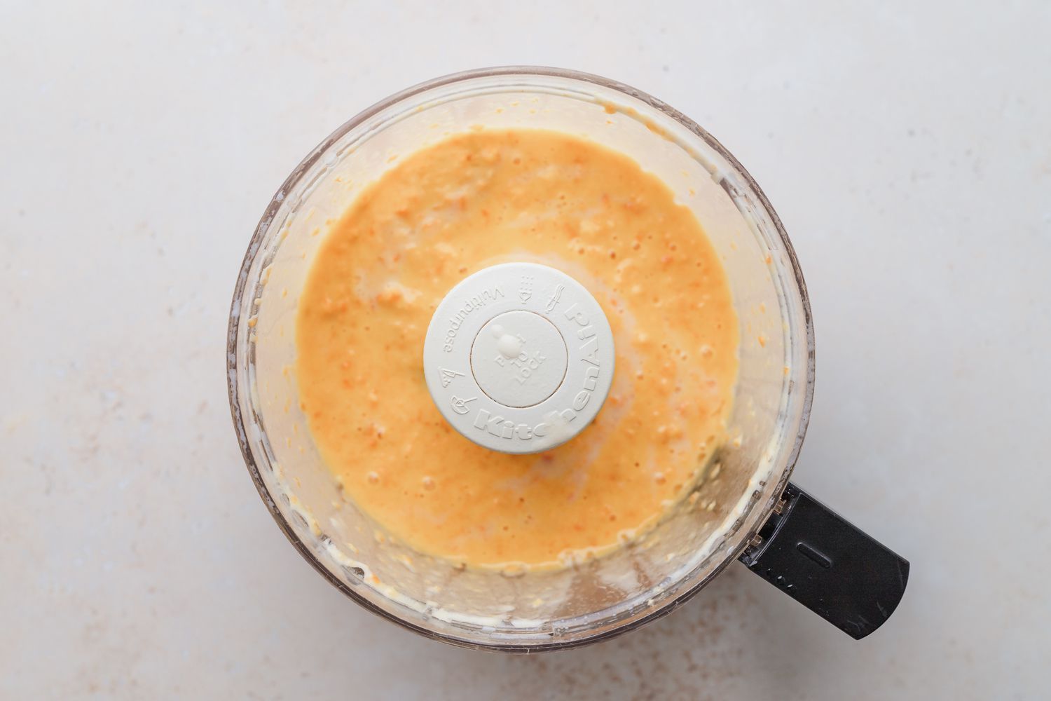 Clementines pureed in a food processor.