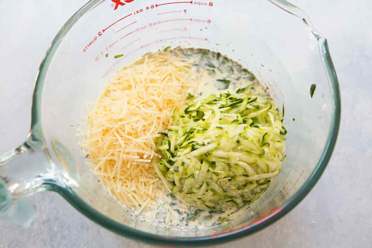 Zucchini quiche recipe add grated parmesan and grated zucchini 