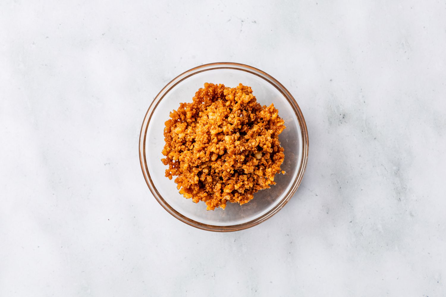latik (coconut sprinkles) in a bowl for biko (Filipino sticky rice cake) recipe