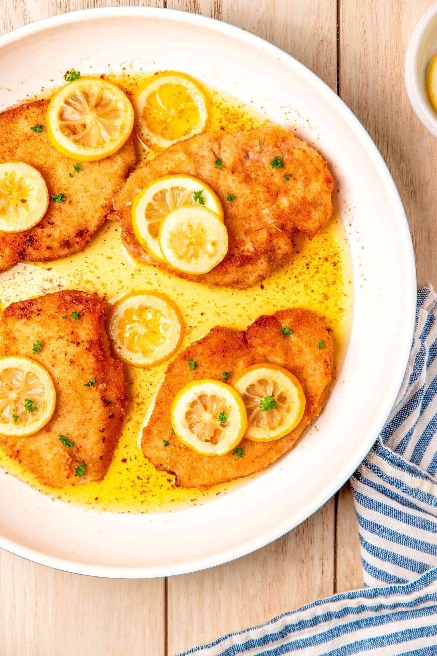Italian butter chicken (petti di pollo al burro) in a skillet