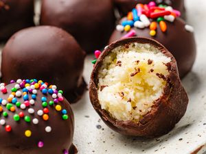 Plate of potato candy with one piece bitten into