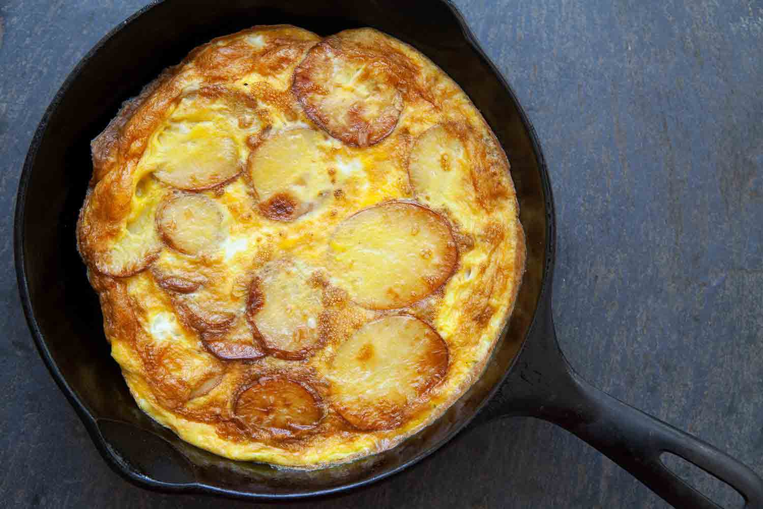 Spanish Tortilla Recipe in a cast iron pan