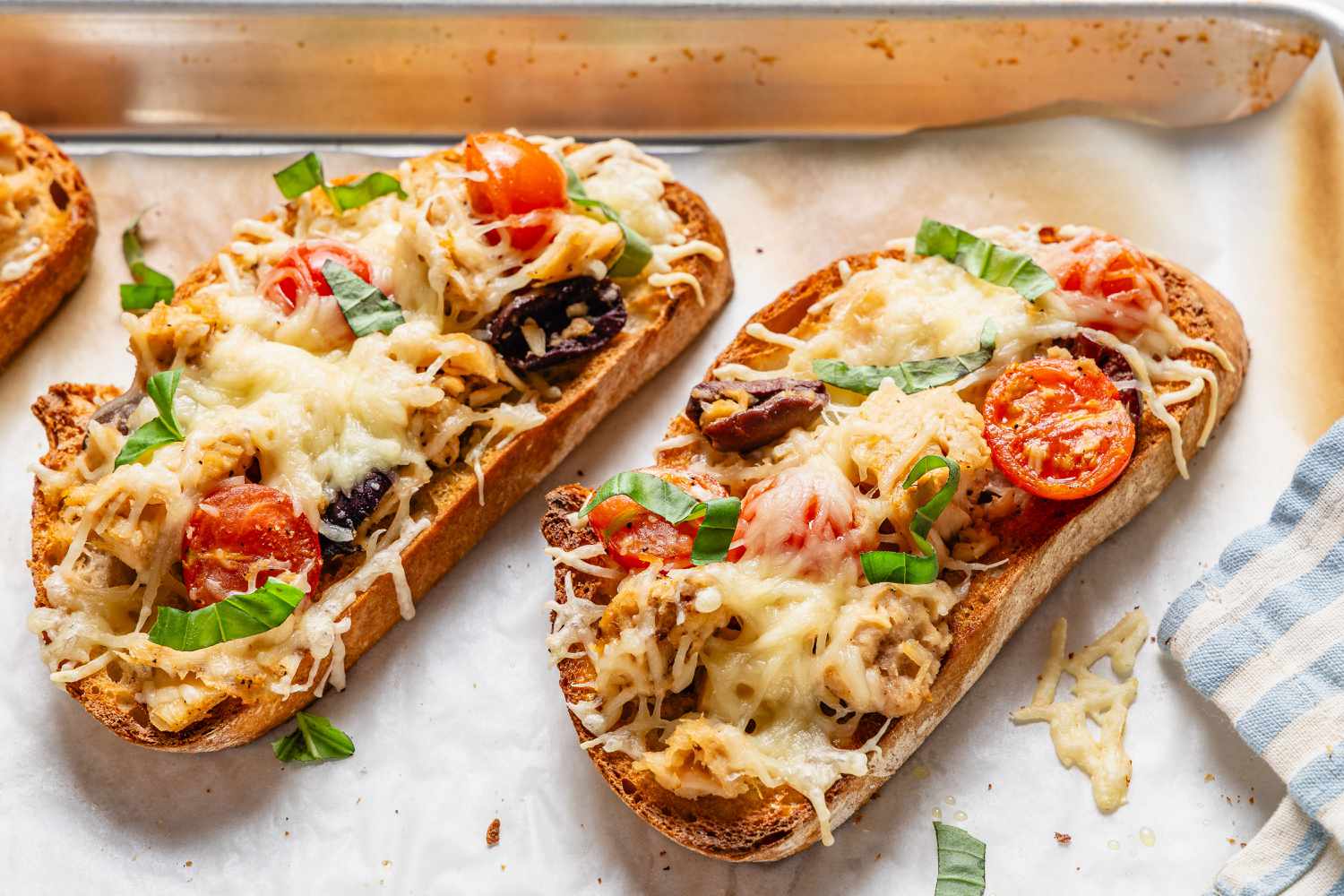 2 Tuna Niçoise Melts on a sheet pan