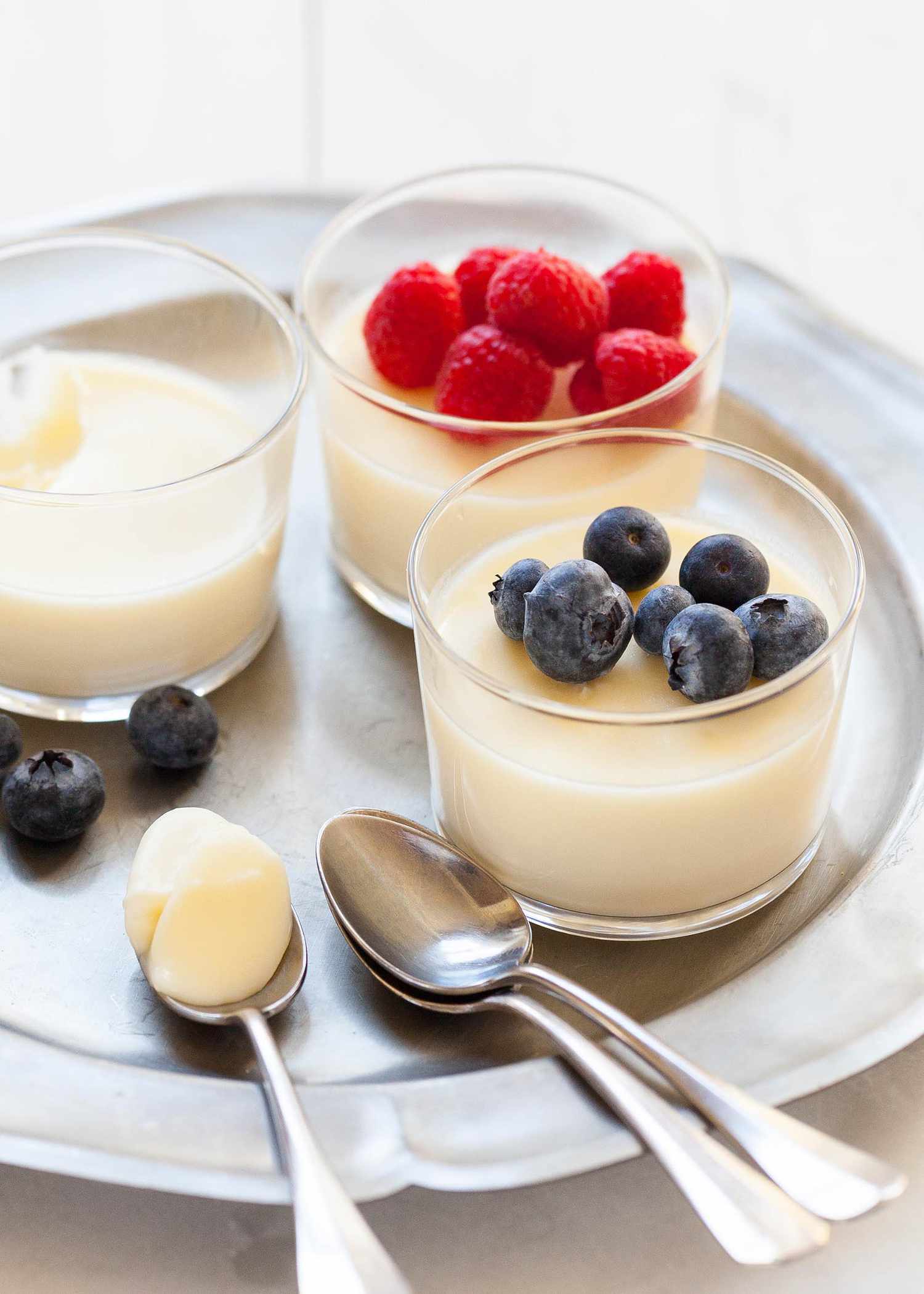 Easy Lemon Pudding dessert cups, topped with berries