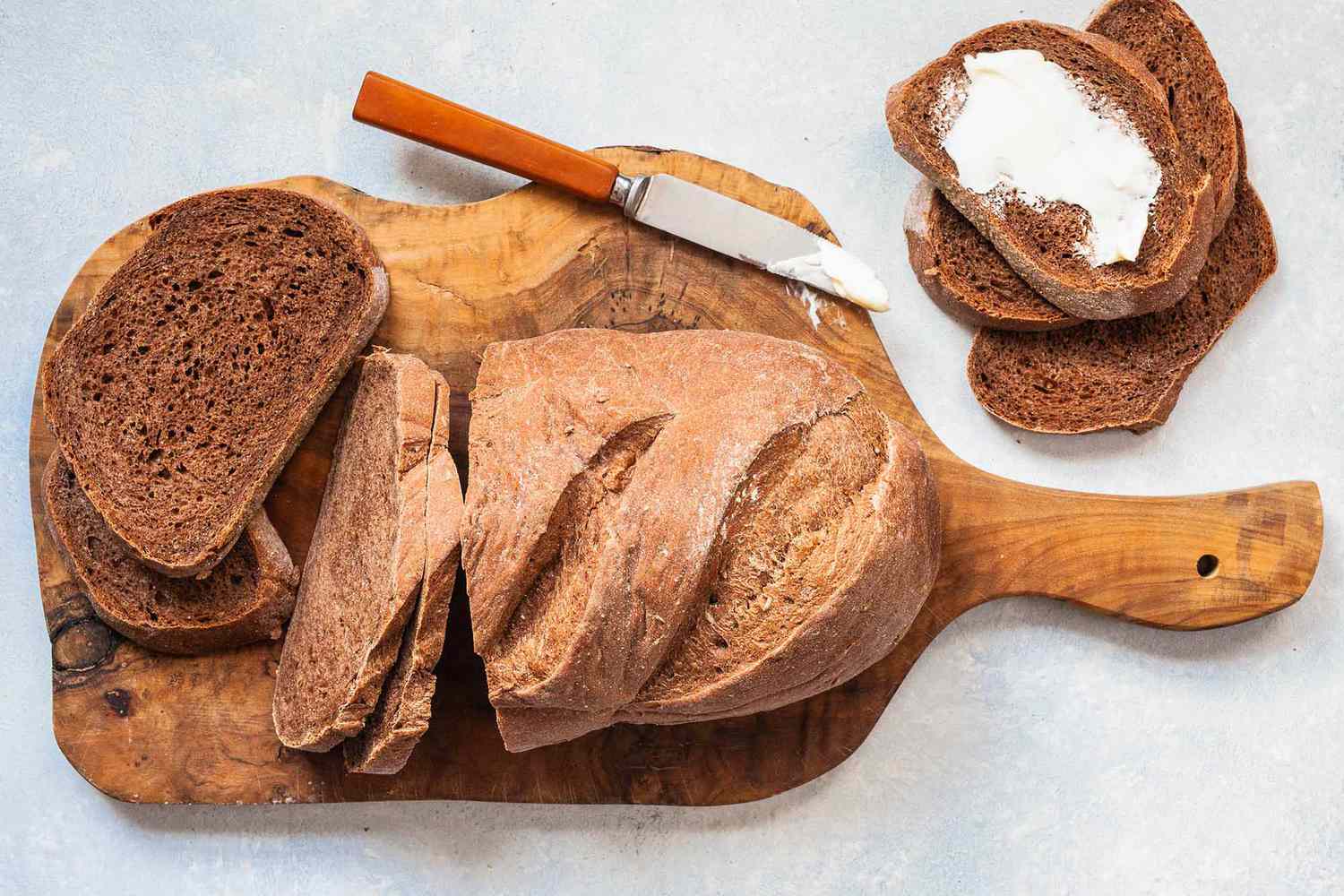 a loaf of rye bread, sliced 