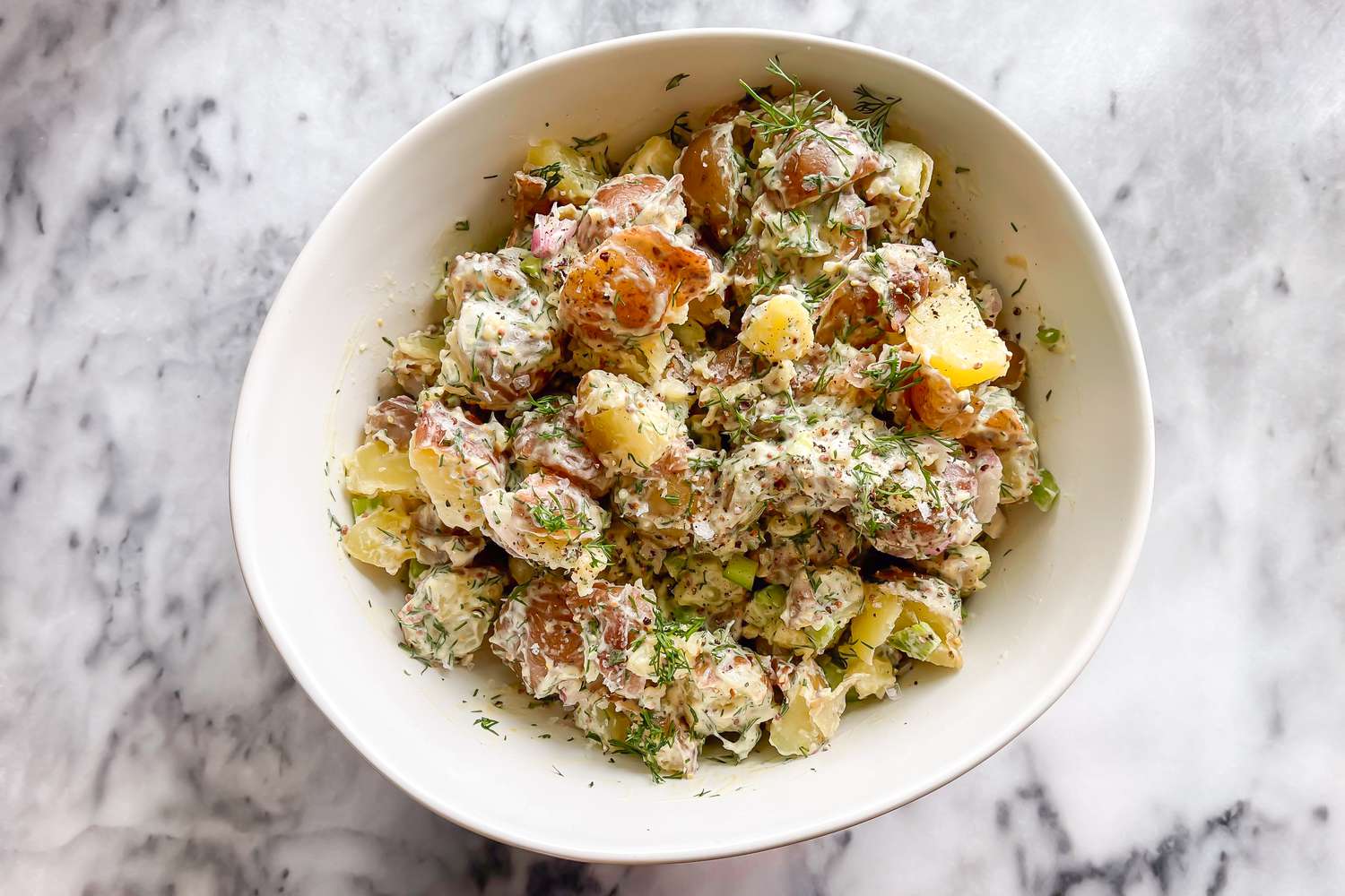 Ina Garten's potato salad in a white bowl