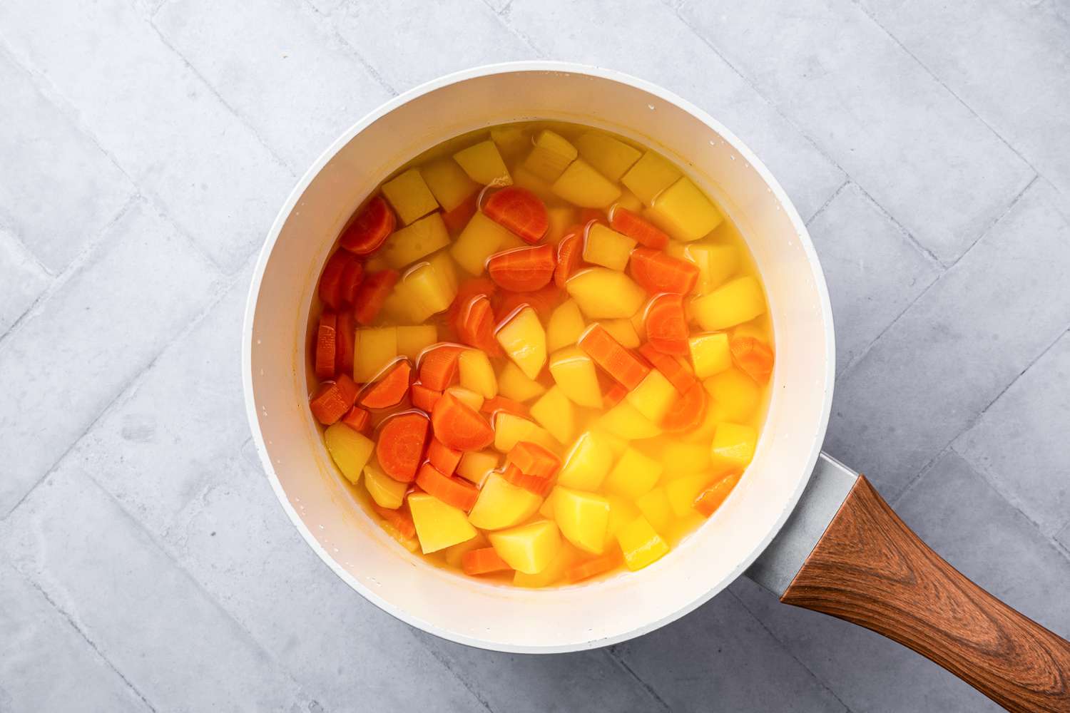 Boiled Carrots and Potatoes in a Pot for Macaroni and Cheese Vegan Recipe