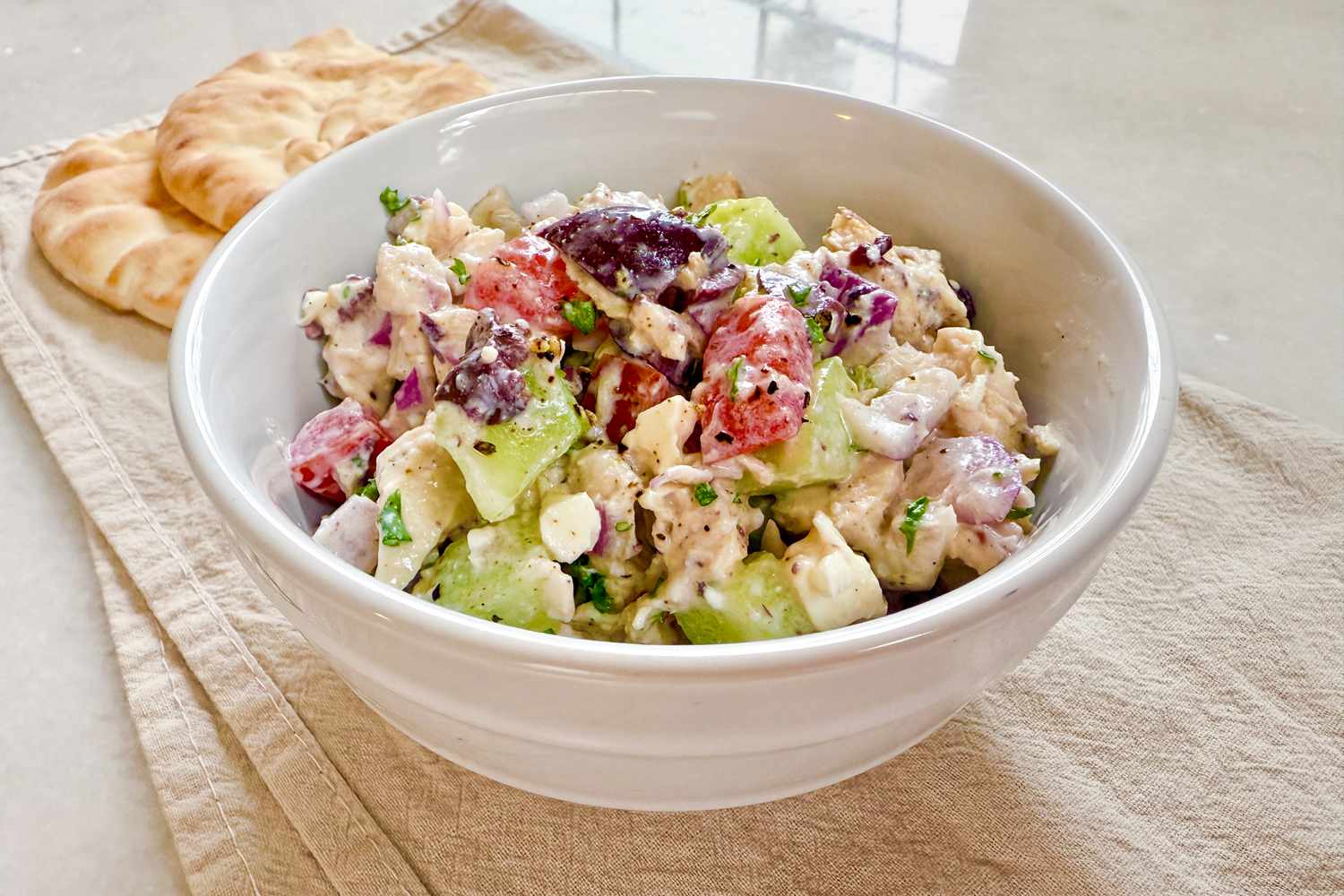 A bowl with Alton Brown's Greek chicken salad recipe