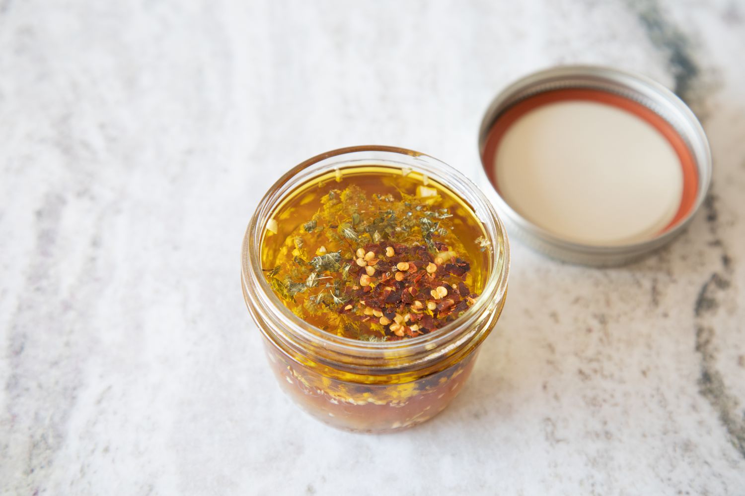 Combine ingredients for greek salad dressing