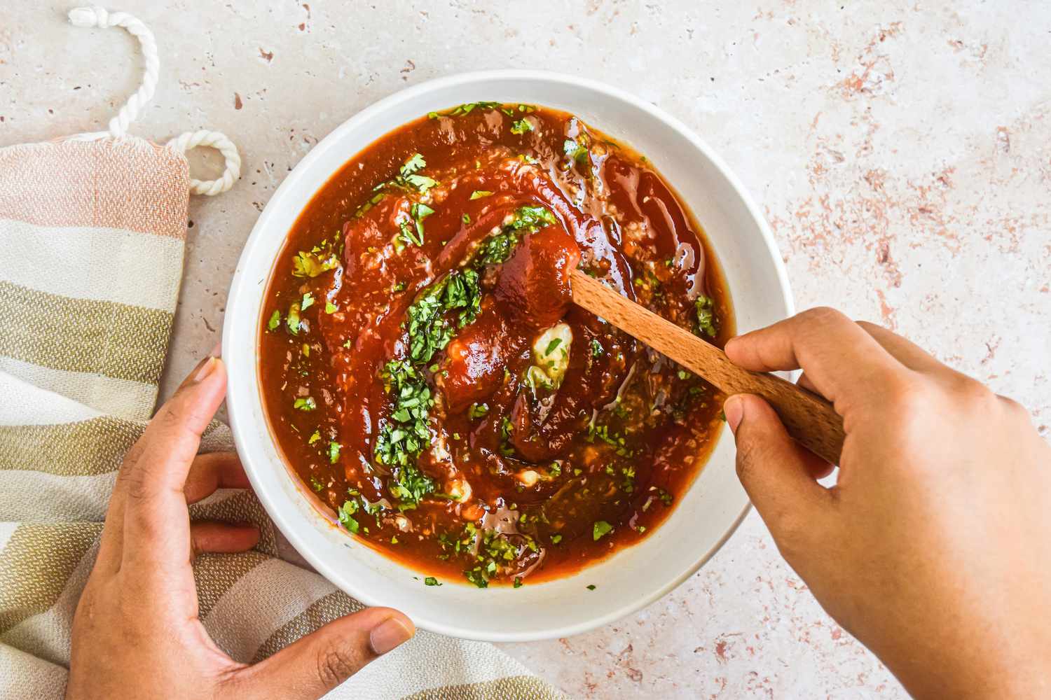 Stirring Shrimp Cocktail Sauce ingredients together in a bowl