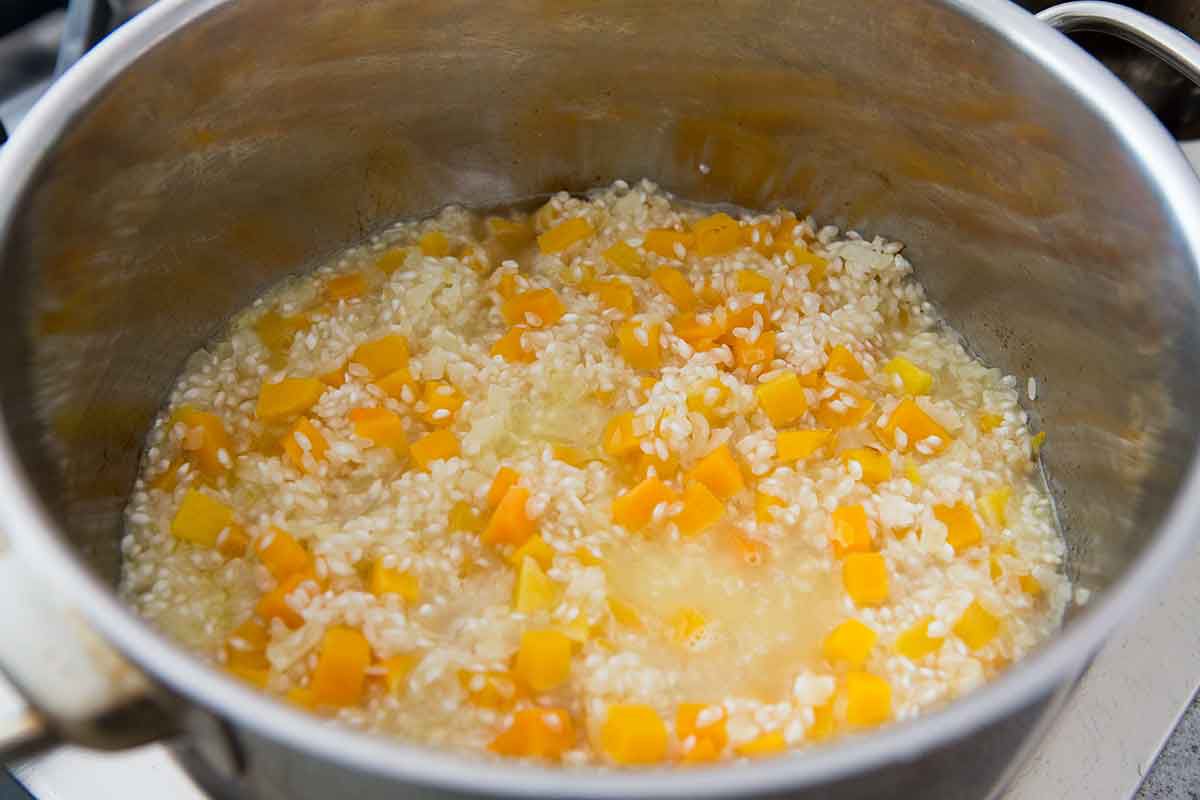 butternut squash risotto ingredients in a pot