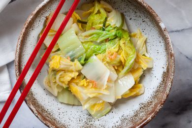 Napa Cabbage with Dried Shrimp in a bowl with chopsticks.