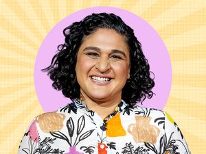 Chef Samin Nosrat against a decorative background