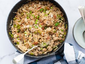Overhead view of dirty rice in a skillet.
