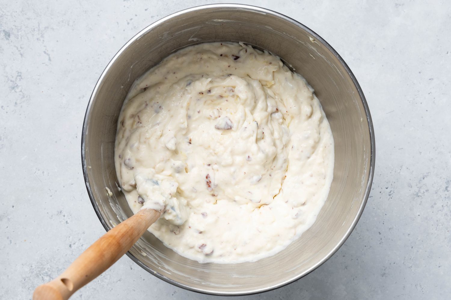 Million Dollar Pie Filling in a Bowl After Canned Pineapple Was Added to the Filling