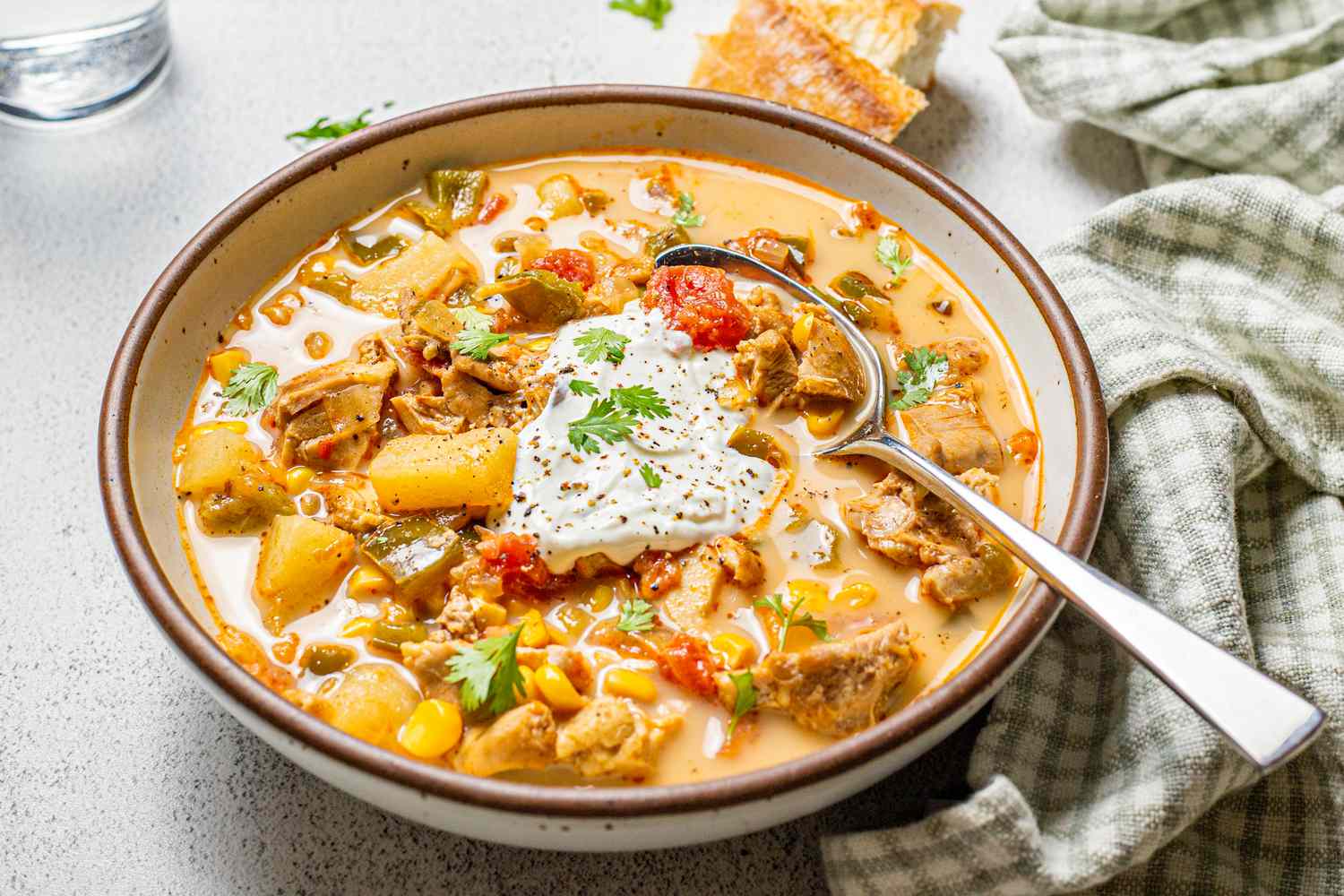 Chipotle Chicken Chowder Garnished with Sour Cream and Cilantro