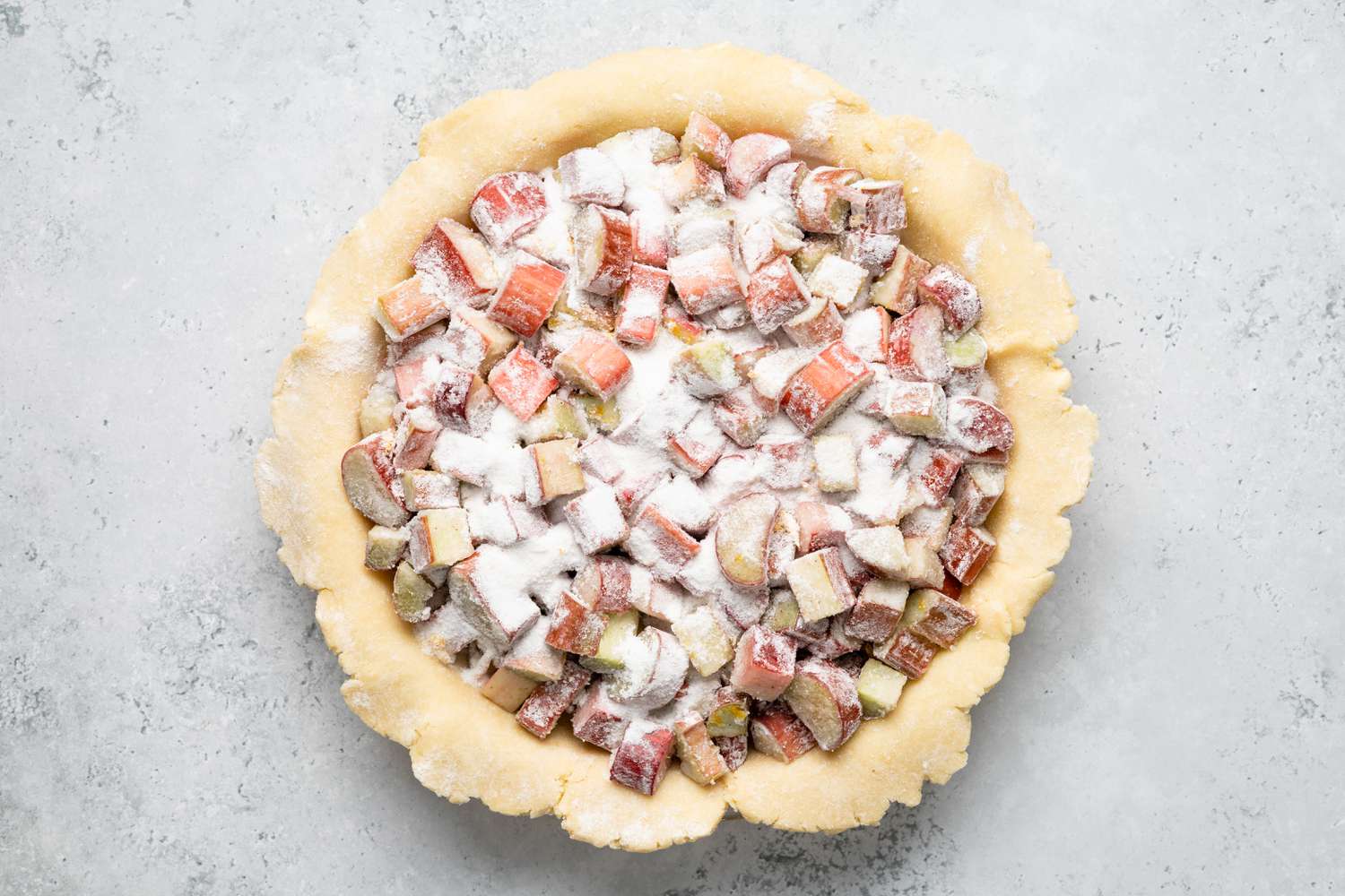 Rhubarb Pie Filling Added to Pie Crust 