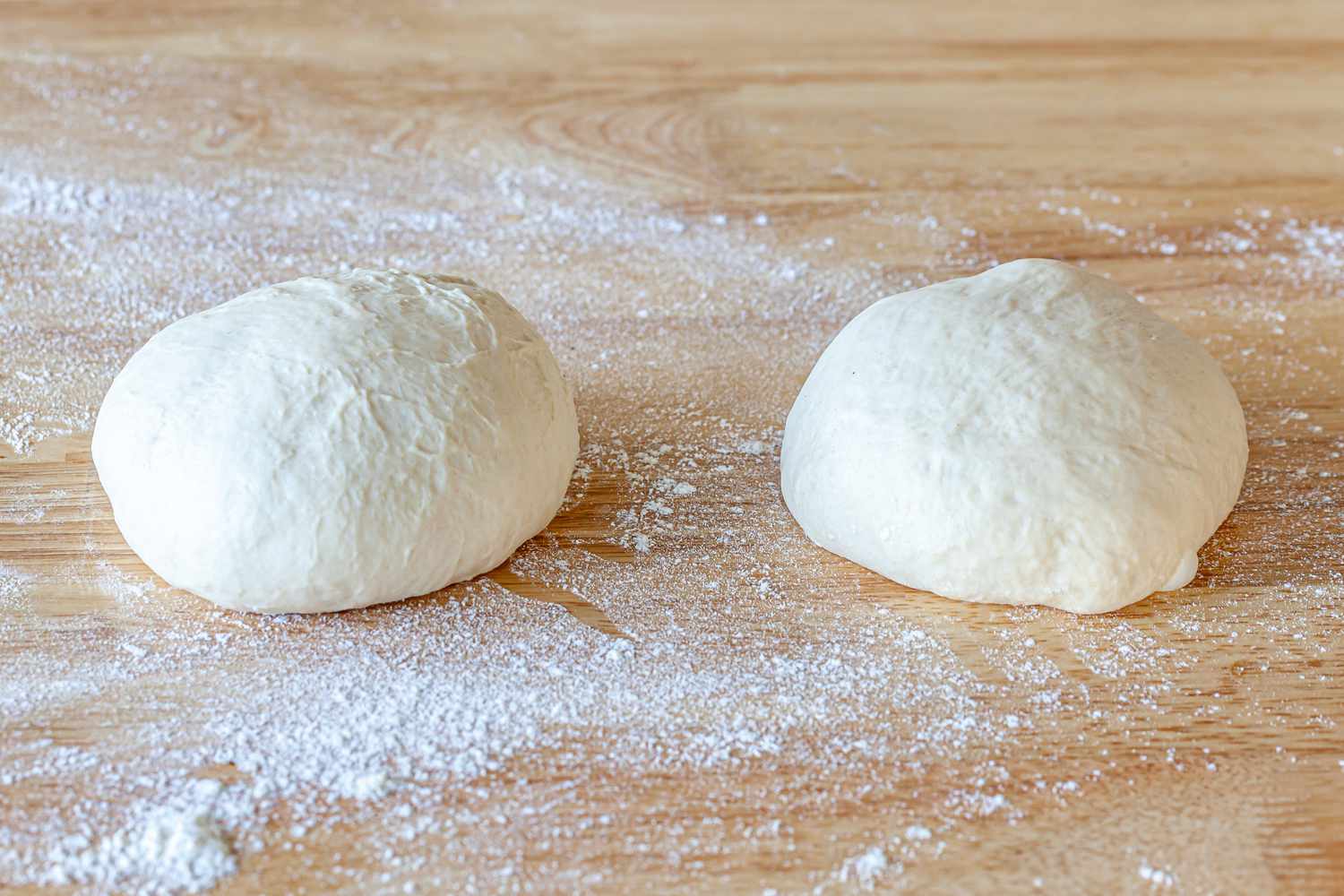Two pizza dough balls.