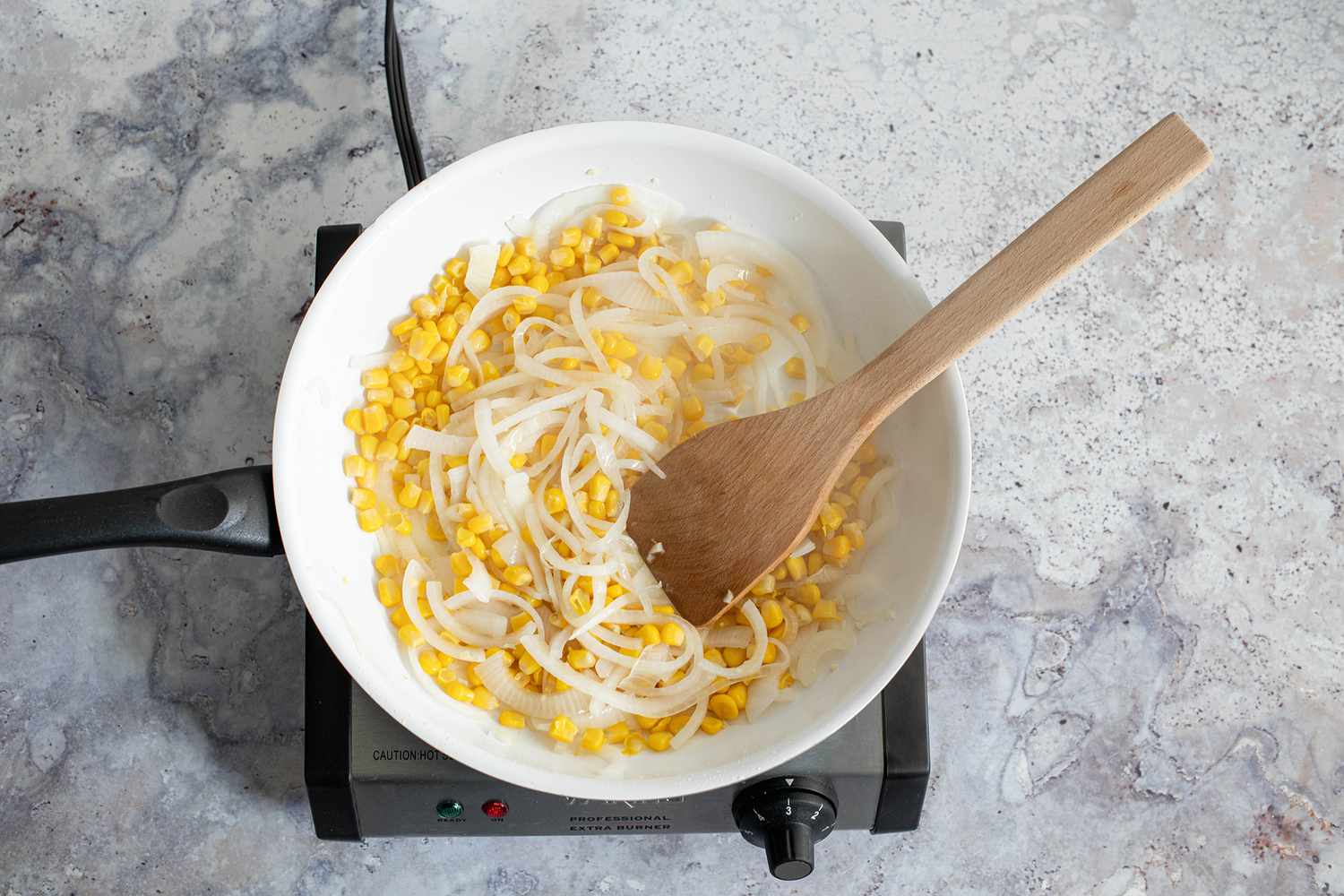 Corn Added to Onions in the Skillet 