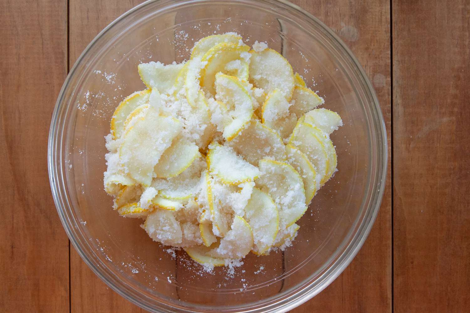 Lemons covered in sugar to make a Lemon Shaker Pie Recipe.