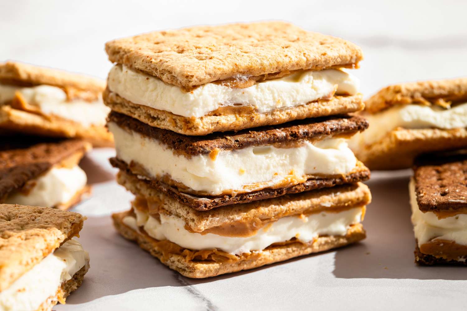 Stacked graham cracker sandwiches with creamy filling