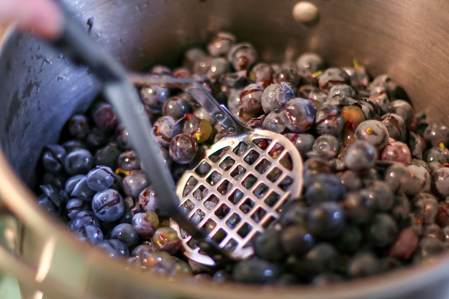 Showing how to make grape juice.