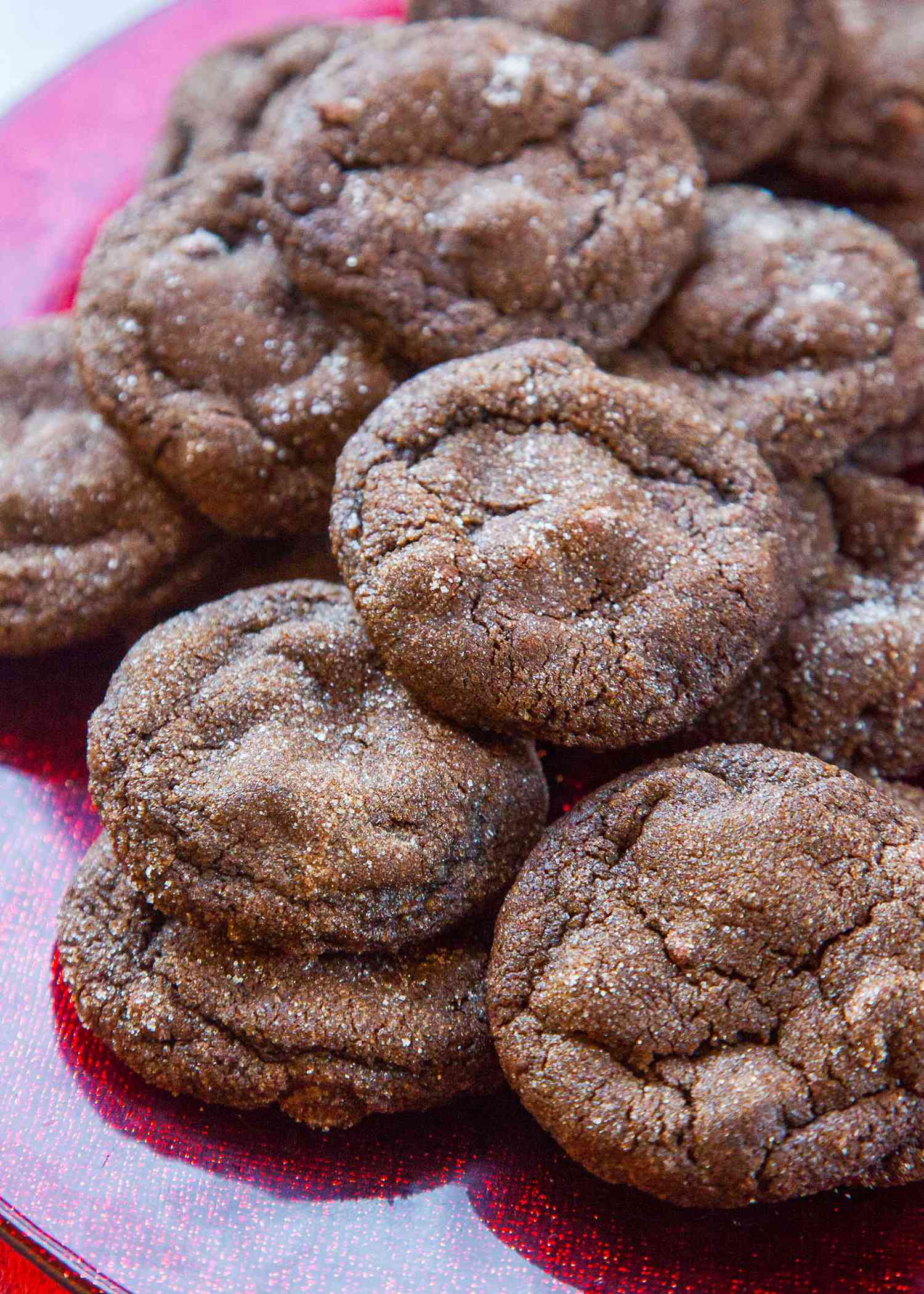 chewy gingerbread chocolate cookies on a red plate