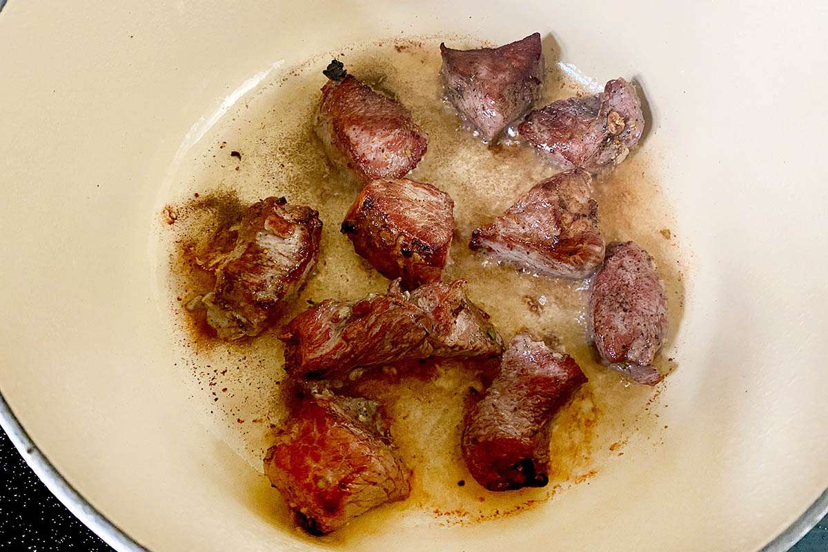 Seared beef in a dutch oven to make Spicy Beef Stew.