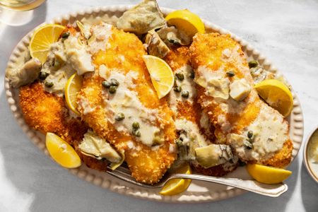 overhead view of Lemon-Artichoke Chicken Piccata on a platter