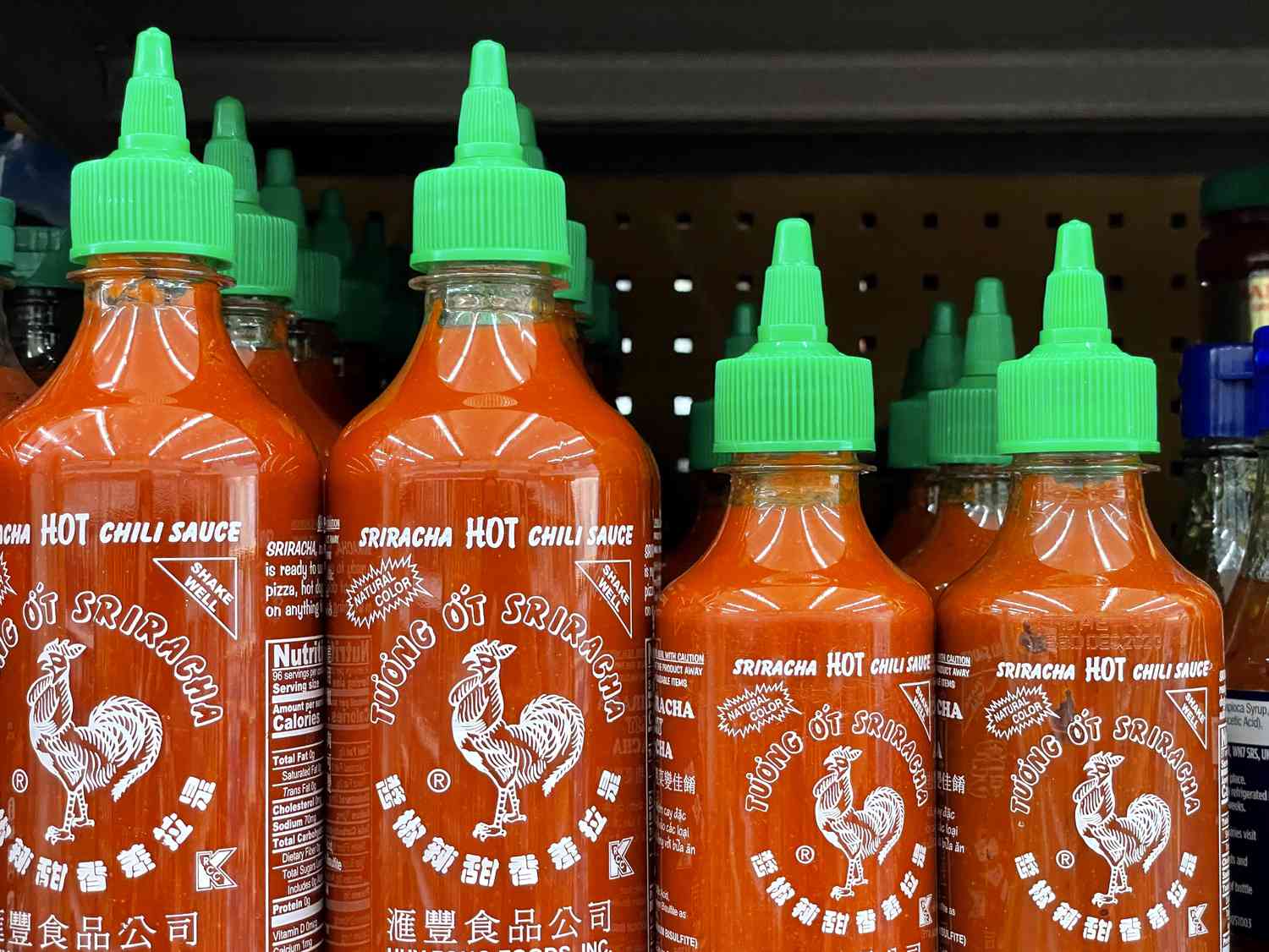 Sriracha bottles in the grocery store