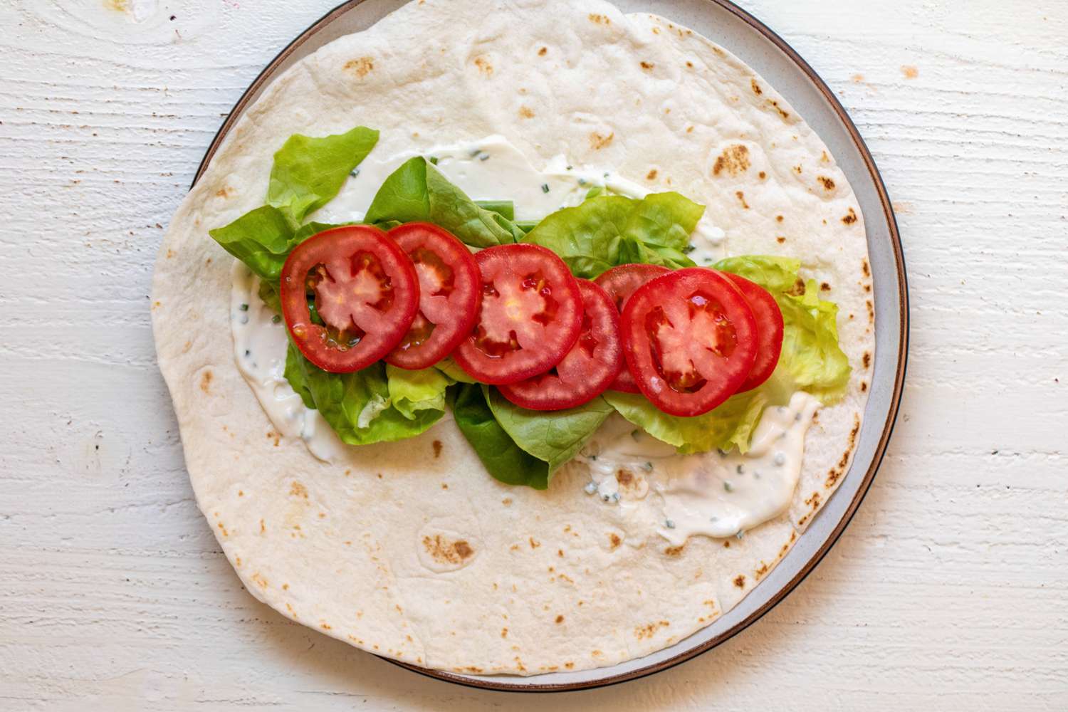 Tortilla with Mayo, Lettuce, and Tomato Slices for BLT Wraps