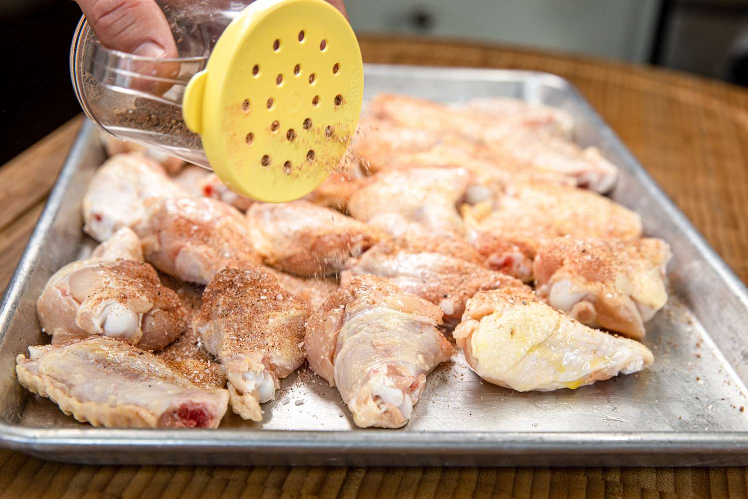 Season Wings with Sharp Scissors for Chicken Wings Recipe