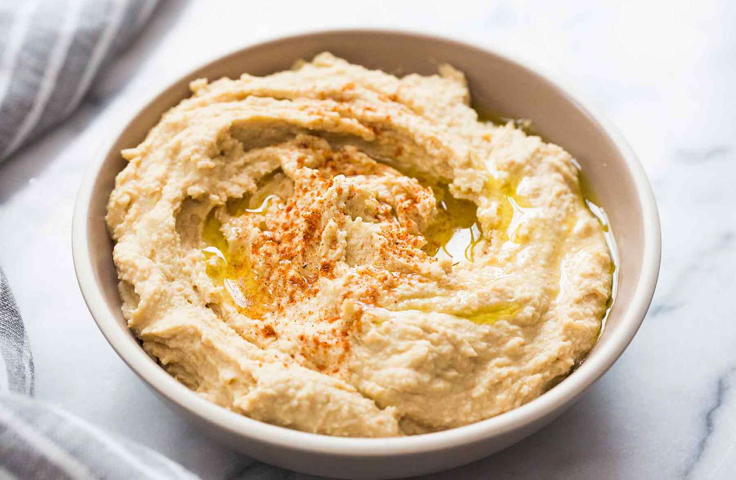Best homemade hummus in a white bowl